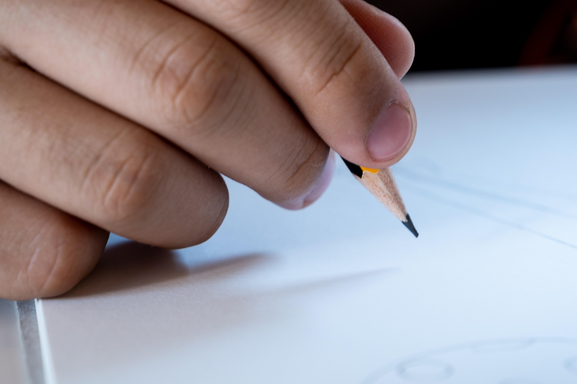 Stilisierte schreibende Hand